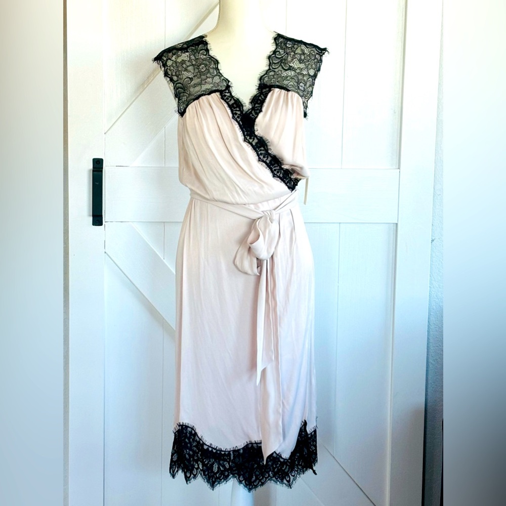 Anthropologie sleeveless lace wrap dress with cinched waist in the back